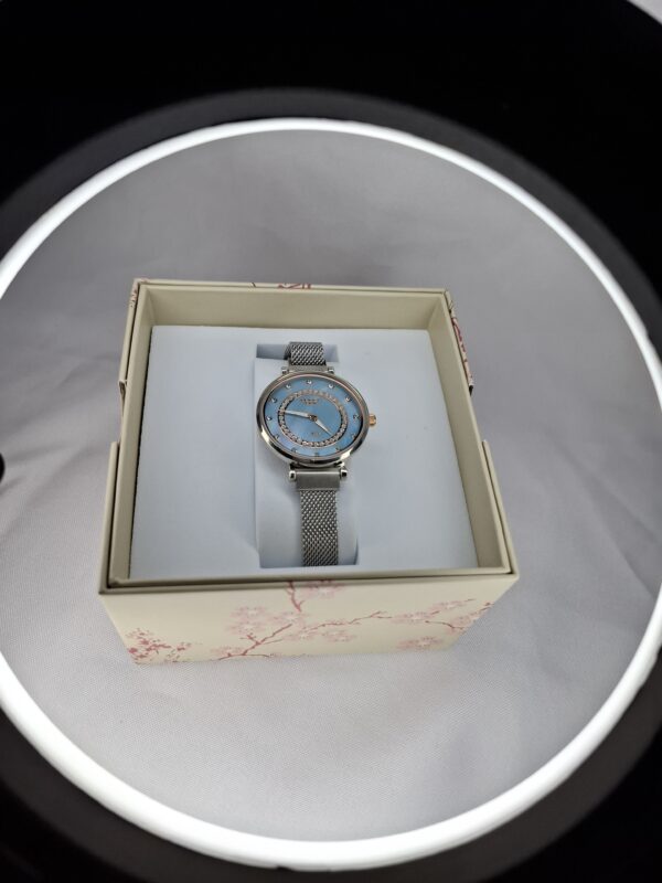 RELOJ CUBIC CELESTE 14297